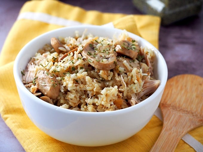 Pressure Cooker Chicken and Rice with Mushrooms in a white bowl