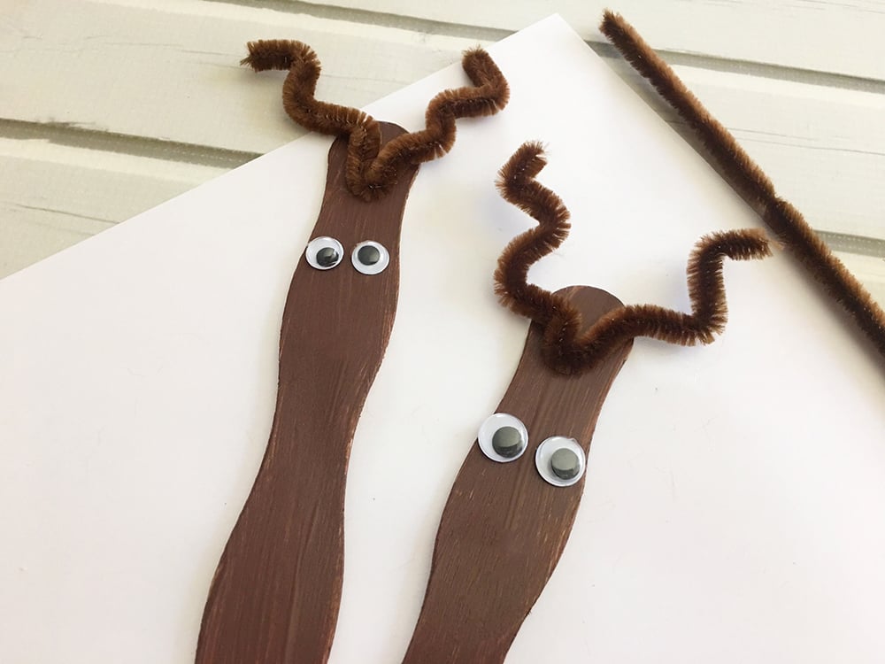 Glue googly eyes on to the craft sticks to make goofy reindeer eyes