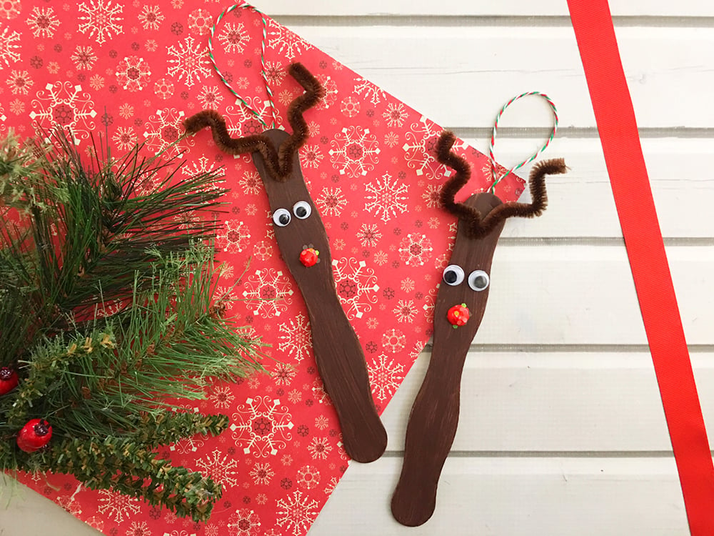 Light up the reindeer nose with some sparkly glitter as the finishing touch on these reindeer onaments