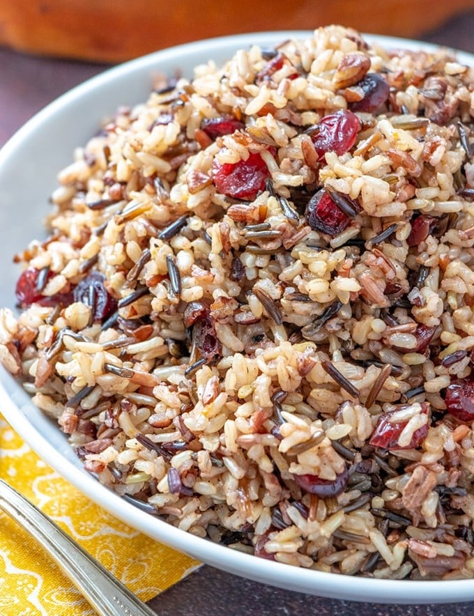 Cranberry Pecan Wild Rice Stuffing in a white serving bowl