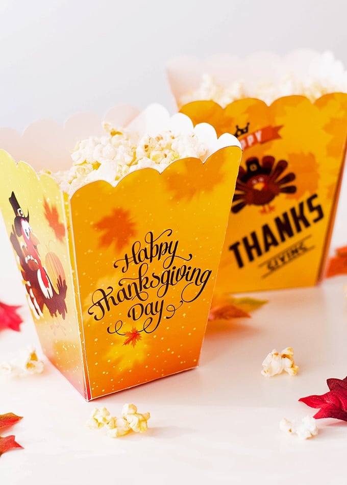 Celebrate Thanksgiving with these cute printable Thanksgiving popcorn boxes. Perfect for movie watching and game day viewing. 