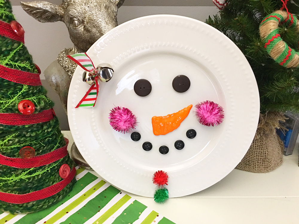 This simple DIY decorative Snowman plate is an easy craft you can make with Dollar store supplies