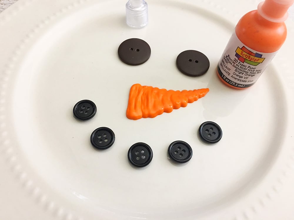 DIY Snowman Decorative Plate - draw a nose on the plate using orange puffy paint