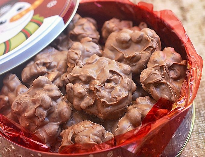 crockpot chocolate peanut candy in red snowman tin