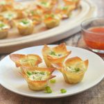 Crab Rangoon Wonton Cups with all the flavors of your favorite Chinese appetizer but baked for less guilt snacking. Crispy, creamy and tasty, they're a guaranteed party hit!