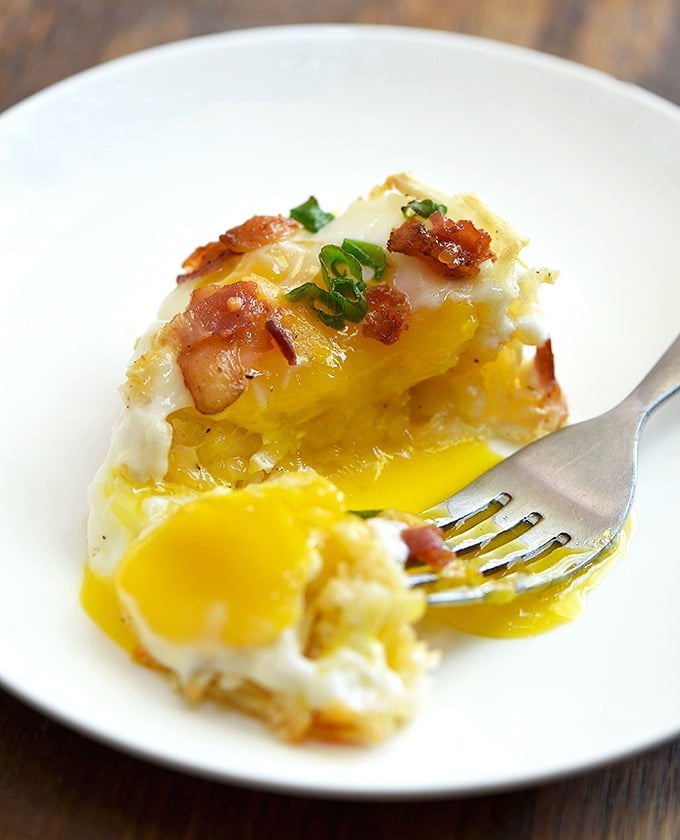 baked hashbrown egg cups with runny yolks