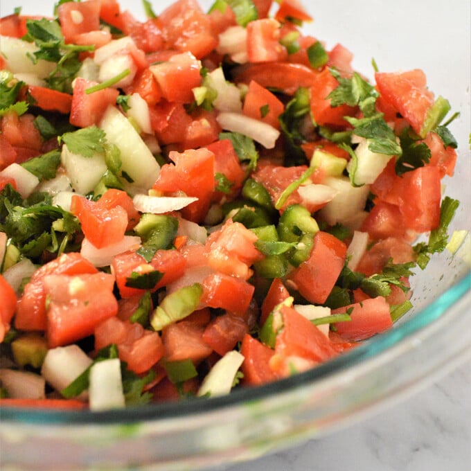 Homemade Pico de Gallo in a clear bowl.