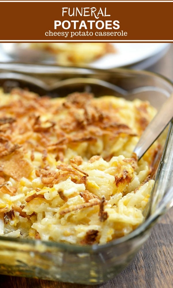 hashbrown potato casserole with french-fried onions in a clear baking dish
