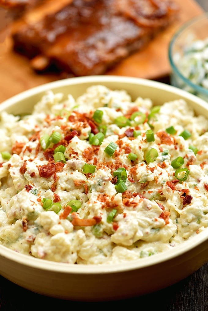 You'll love this loaded potato salad with bacon crumbles, chopped eggs, crisp celery and green onions!