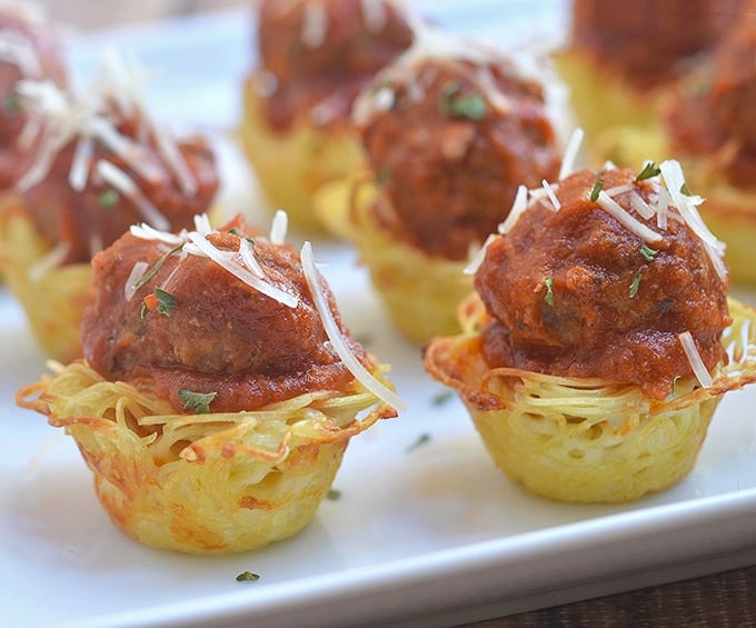 Spaghetti muffins with meatball and marinara sauce are a perfect party food.