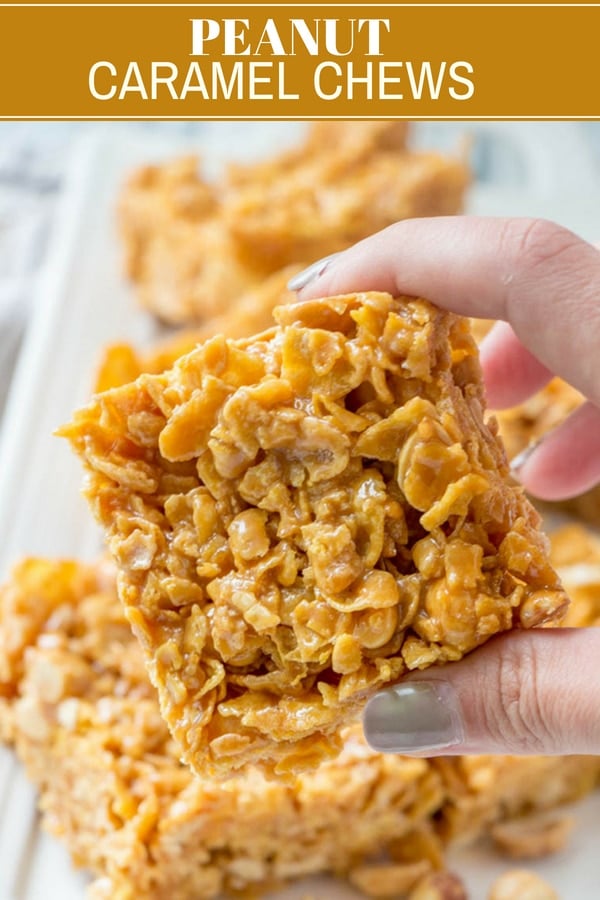 hand holding peanut caramel frosted flakes bars