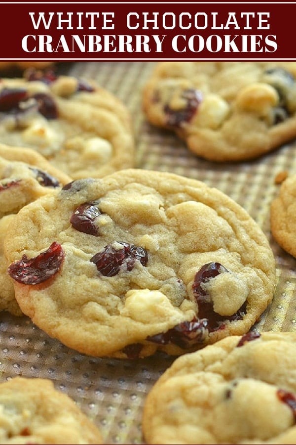 Cranberry white chocolate chip cookies on a baking sheet