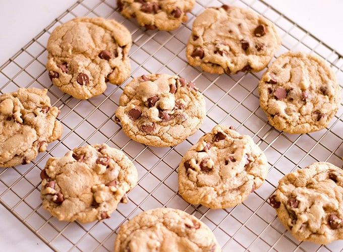 freshly-baked chocolate chip cookies on a wire rack