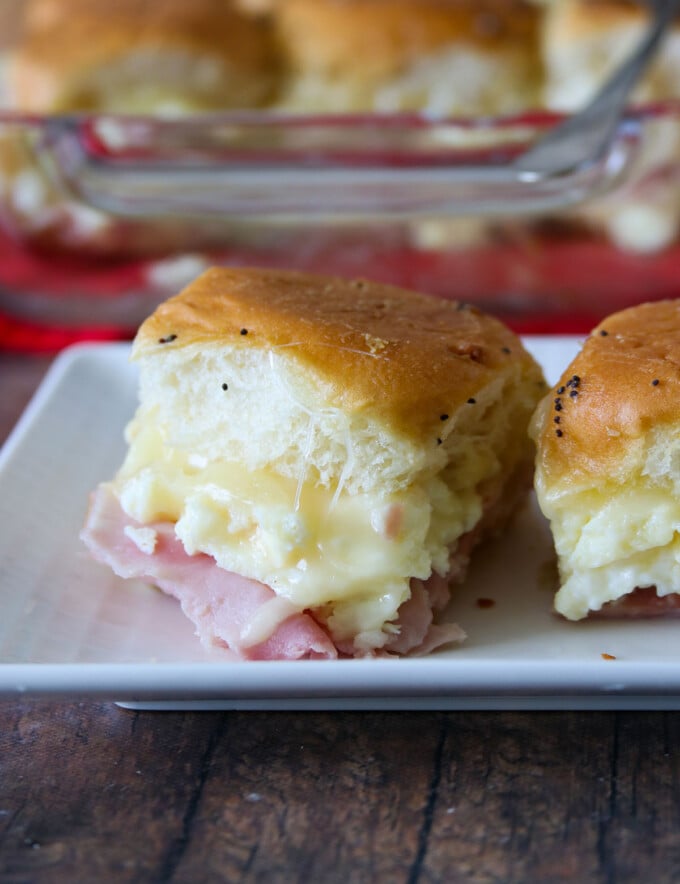 ham egg and cheese breakfast sliders on a white platter