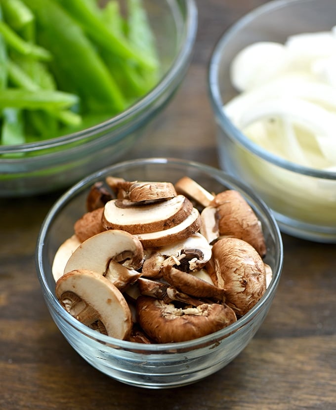 sliced mushrooms, onions, and bell peppers for Philly cheesesteak sliders