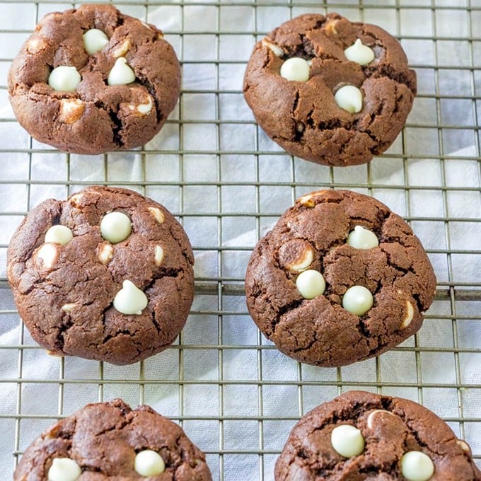 white chocolate chip cookies on a wire rack to cool