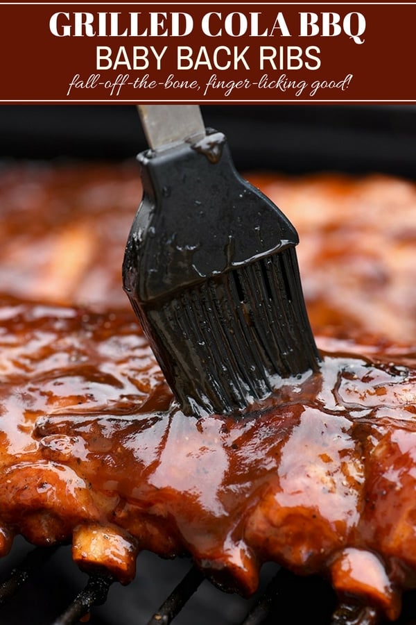 basting grilled baby back ribs with cola BBQ sauce