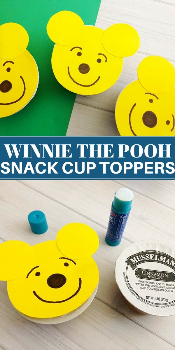 Applesauce cups topped with cut out Winnie the Pooh topper