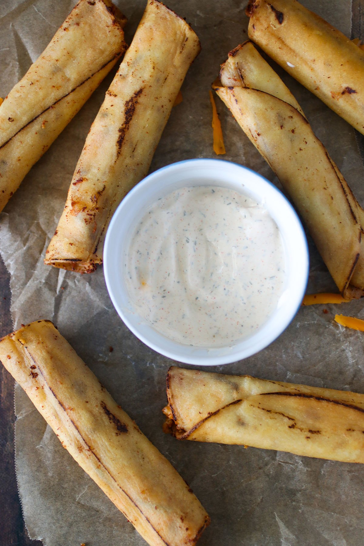 chicken taquitos on a baking sheet