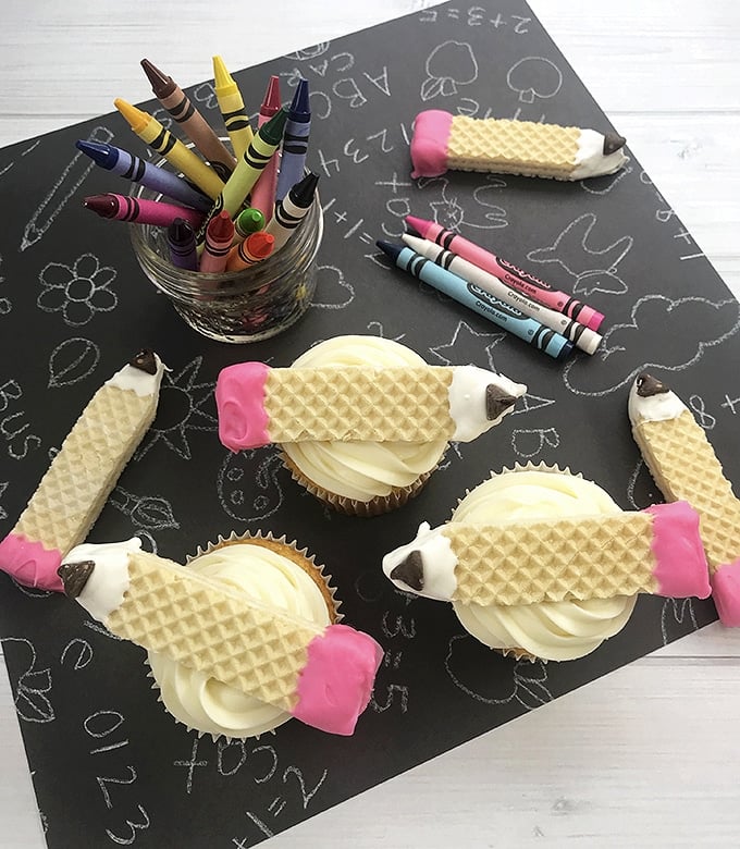 pencil design back-to-school cupcakes decorated with candy-coated sugar wafer cookies