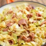 Southern Fried Cabbage in an orange enameled cast iron skillet