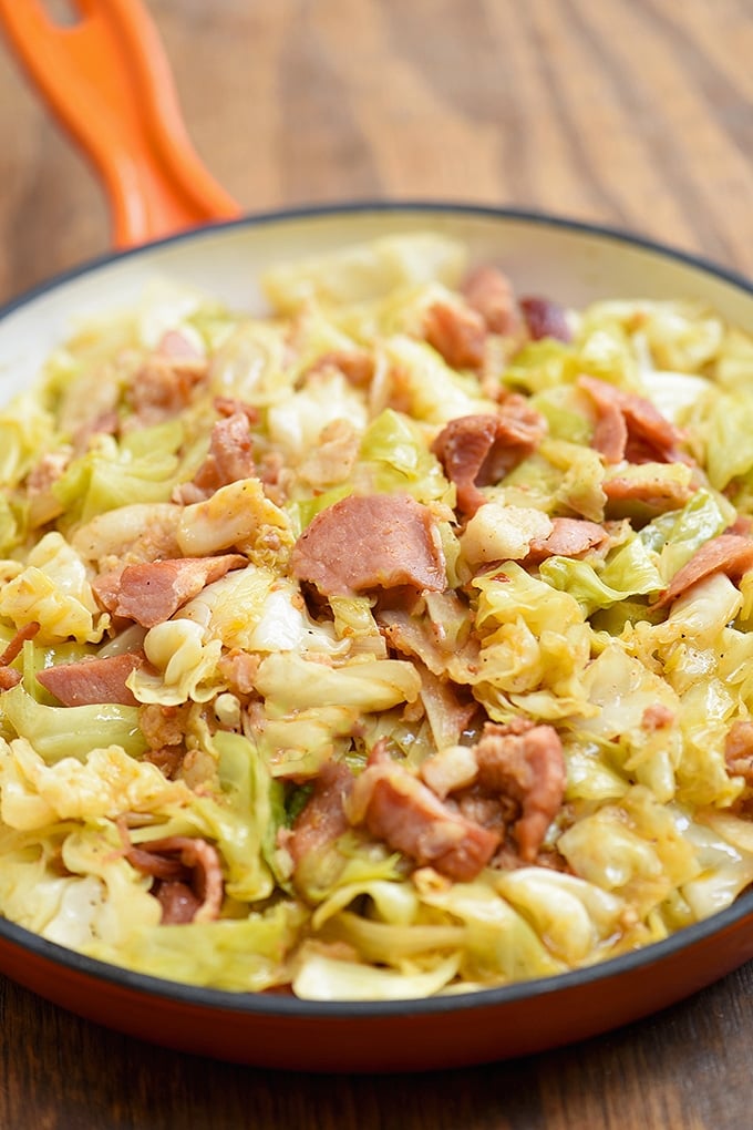 Southern Fried Cabbage in an orange enameled cast iron skillet