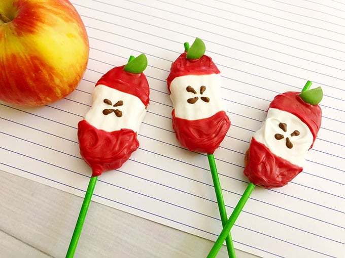 Apple Core Back-to-School Cookie Pops on green lollipop sticks