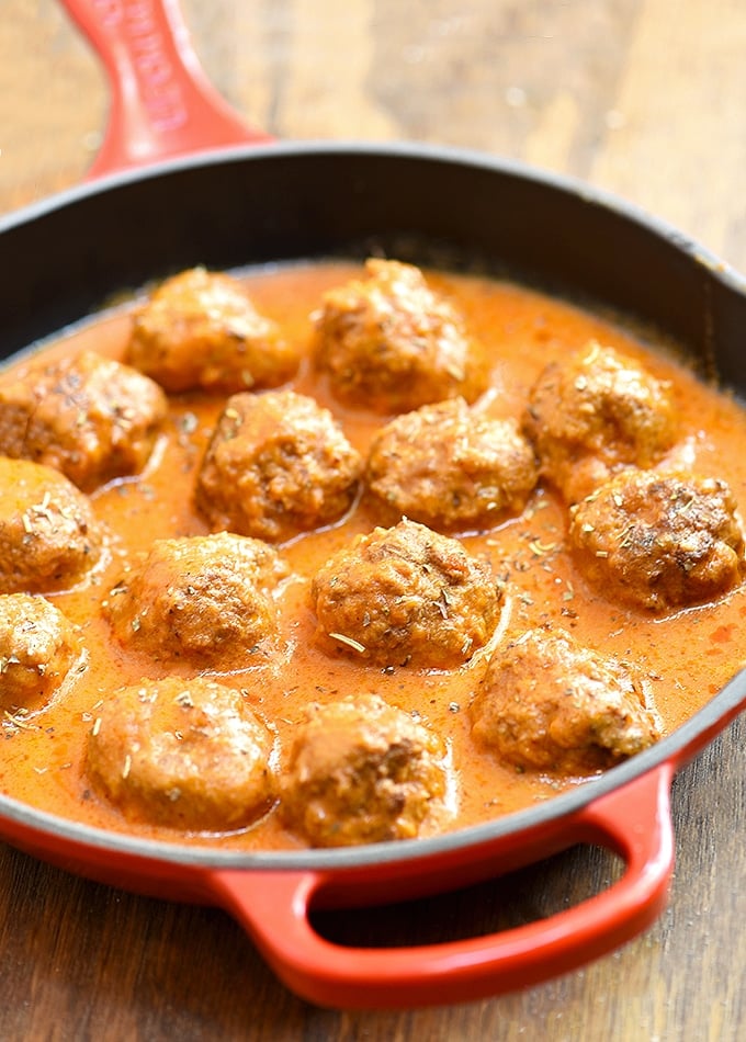 Meatballs with Creamy Tomato Sauce in a red skillet