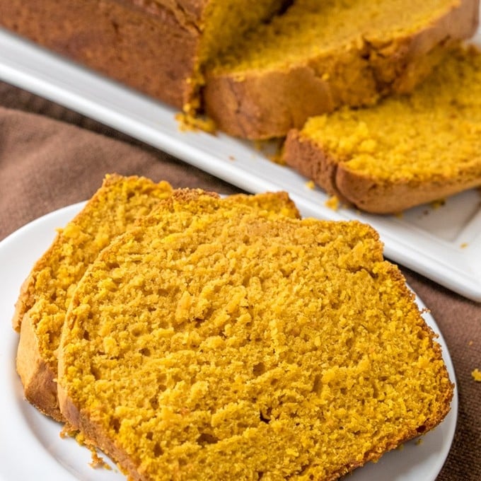 pumpkin loaf slices on a serving plate