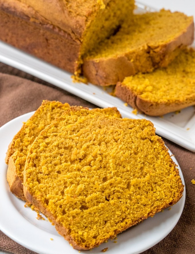pumpkin loaf slices on a serving plate