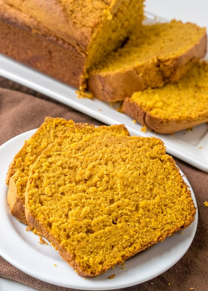 pumpkin loaf slices on a serving plate