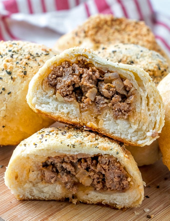 cut baked bread buns with sloppy joe filling