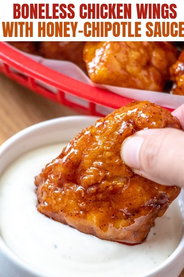 Honey Chipotle Boneless Wings dipped in ranch dressing