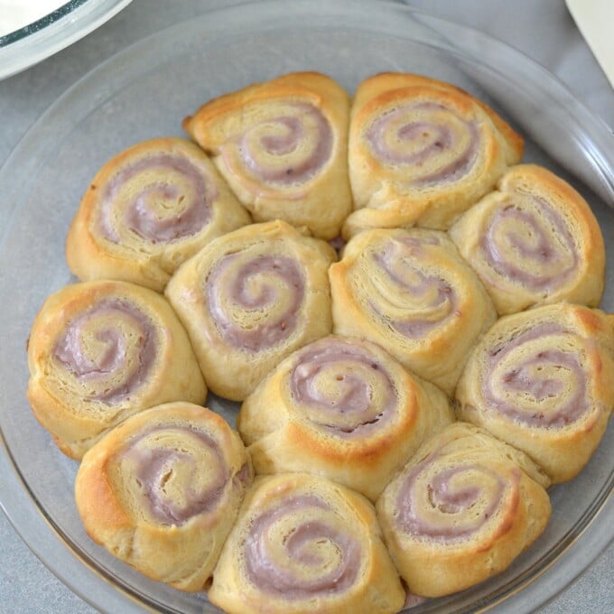 cheese danishes baked in a round glass pan.