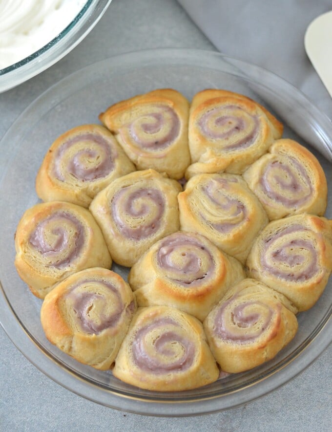 cheese danishes baked in a round glass pan.