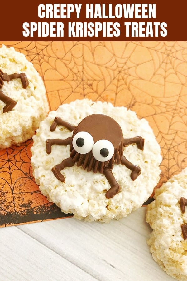 round rice krispies treats with spider peanut butter cup on top