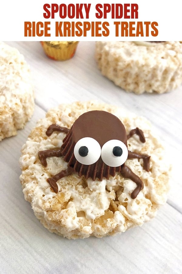 round rice krispies treats decorated with peanut butter cup spiders