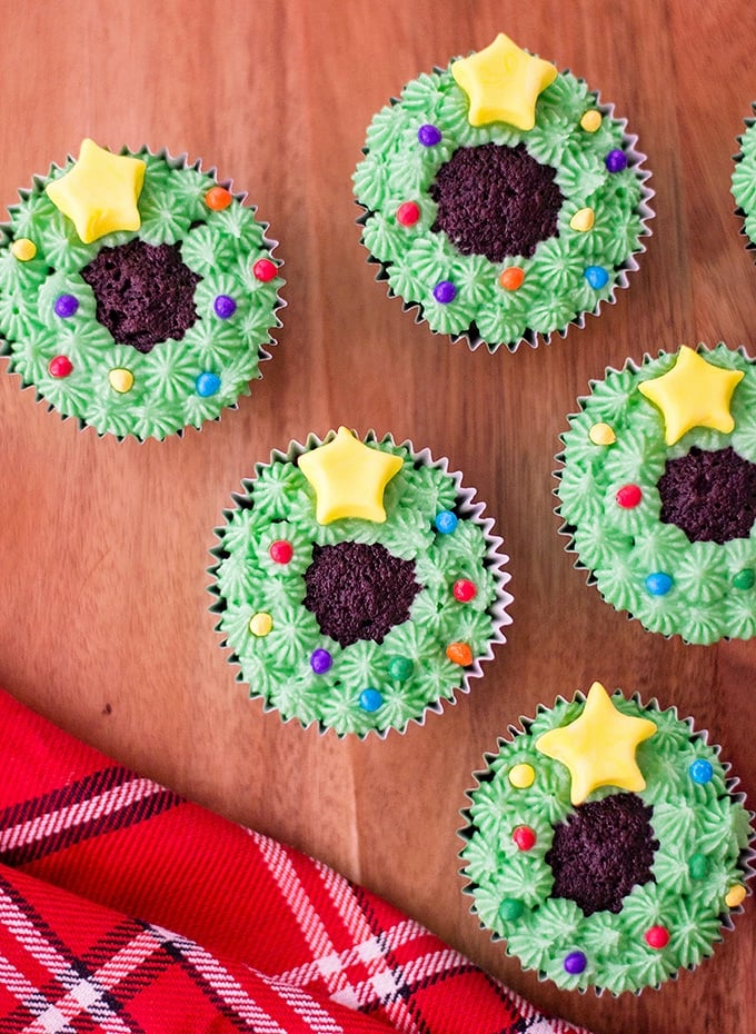 chocolate cupcakes decorated as Christmas wreaths