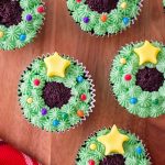 Christmas Wreath Cupcakes on a wood board