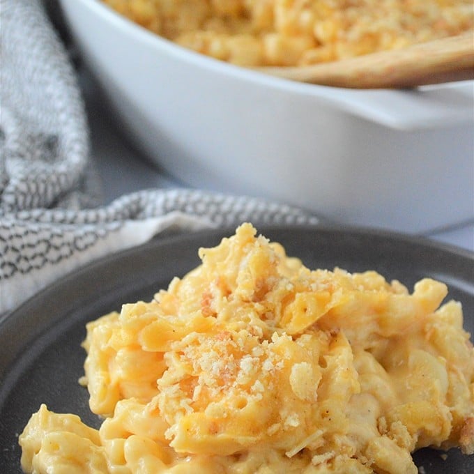 macaroni and cheese on a black serving plate