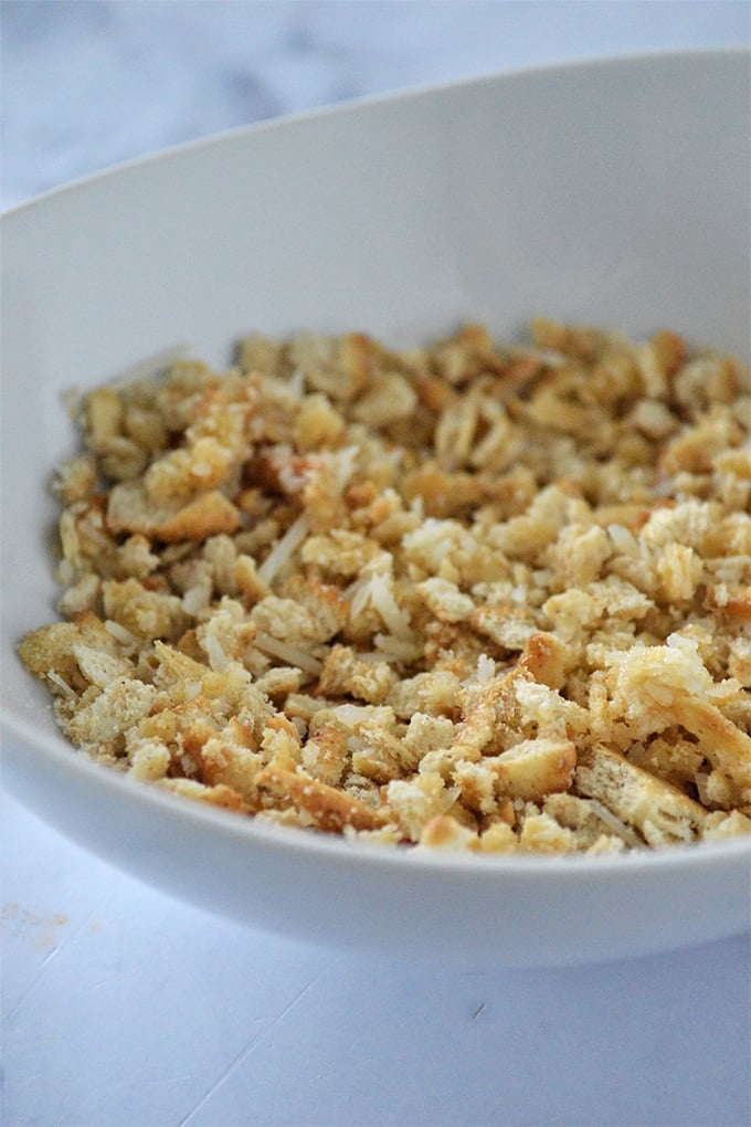 Ritz cracker topping for macaroni and cheese in a white bowl