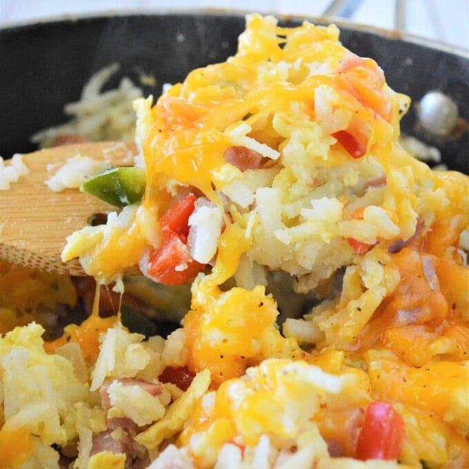 Cheesy breakfast hashbrown potato casserole in a pan