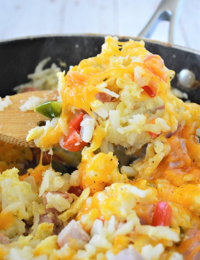 Cheesy breakfast hashbrown potato casserole in a pan