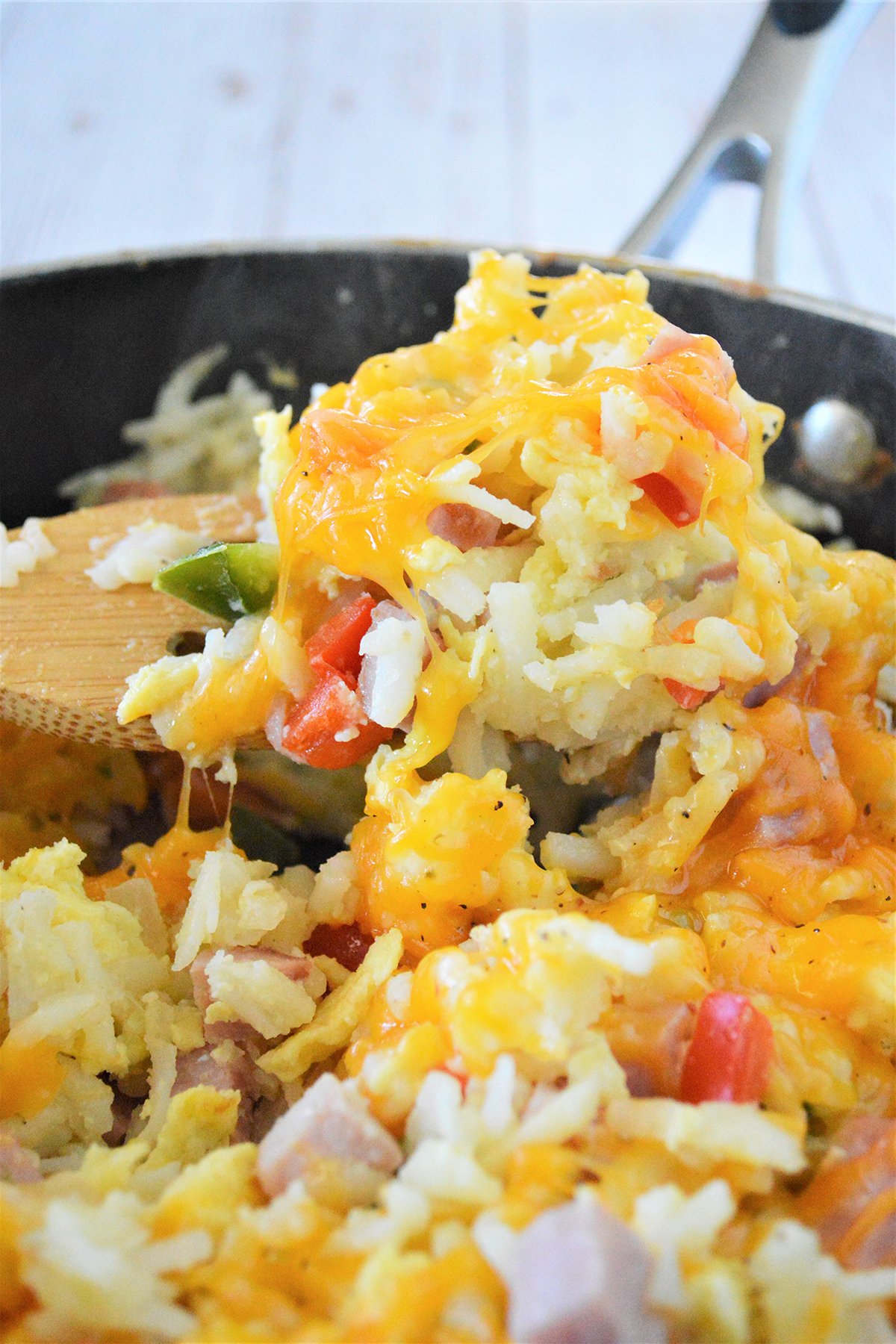 Cheesy hashbrown potato casserole in a pan