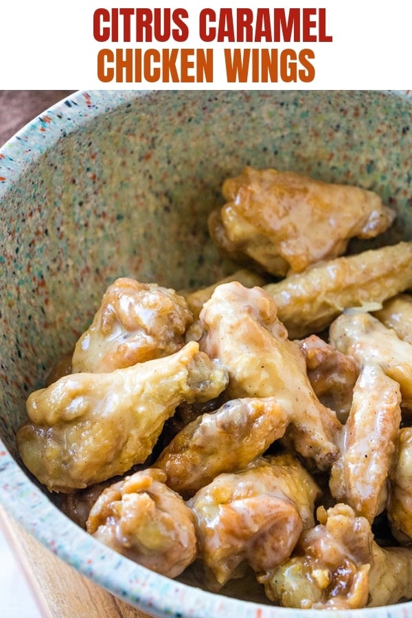 breaded chicken wings tossed in caramel sauce in a bowl