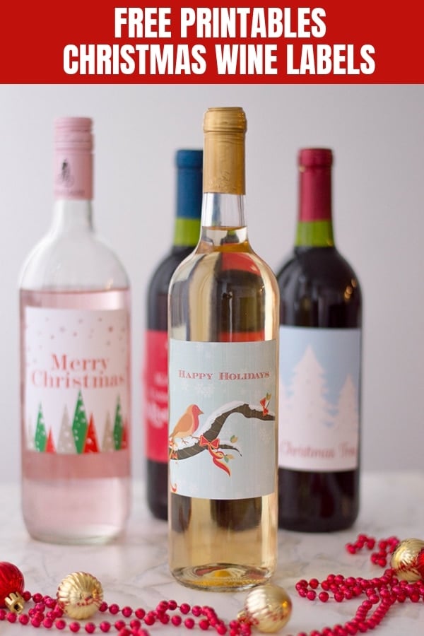 four bottles of wine with Christmas labels