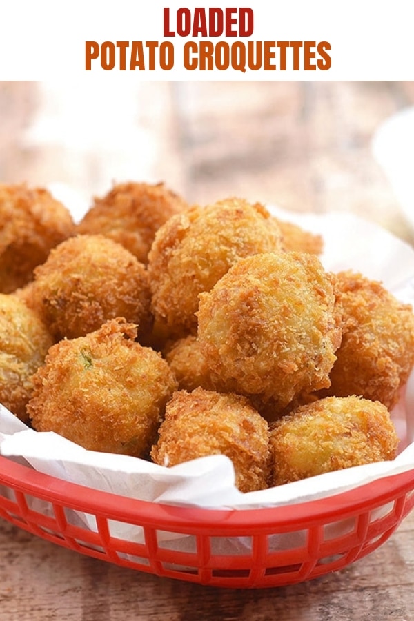 potato croquettes in a paper-lined red plastic basket