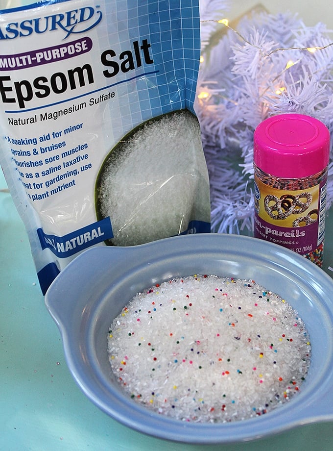 bath salt mixture on a bowl with Epsom salt and sugar sprinkles