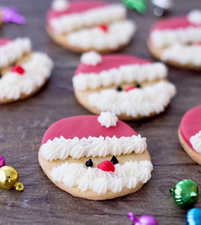 Santa cookies on a wooden board