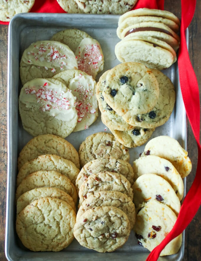 ten fancy cookie flavors made with sugar cookie dough on a baking sheet